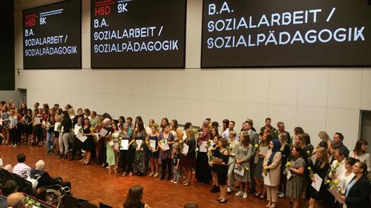the graduates on stage