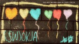Image of the project with inscription: SWOKJA (Selbstwirksam in der OKJA) coloured chalk on paving stone in the shape of a heart balloon